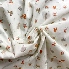 Load image into Gallery viewer, Fabric with animal and floral pattern on a white background