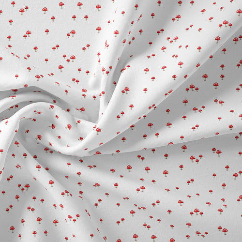 image of white fabric with red mushrooms 