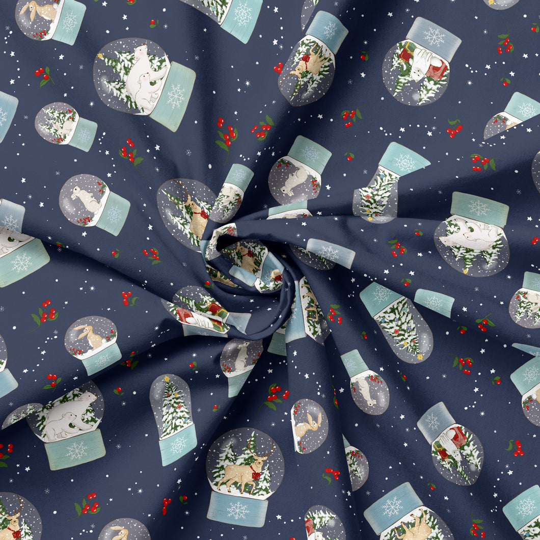 Image of a navy winter or Christmas fabric designed with polar animals inside baby blue snow globes.  