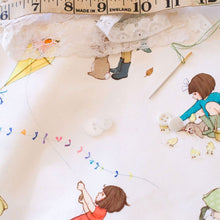 Load image into Gallery viewer, close up of classic belle and boo cotton poplin with tape measure, lace and needle
