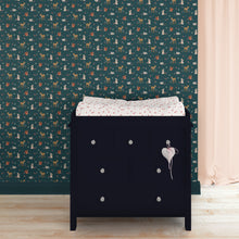 Load image into Gallery viewer, Nursery with a change table and forest friends teal wallpaper

