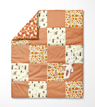 Load image into Gallery viewer, Quilt made from autumn and Halloween fabric. Orange and yellow in colour. Featuring pumpkins, and children and animals.
