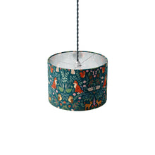 Load image into Gallery viewer, Ceiling lamp shade by Belle and Boo in midnight forest fabric featuring woodland animals on a teal background with flowers
